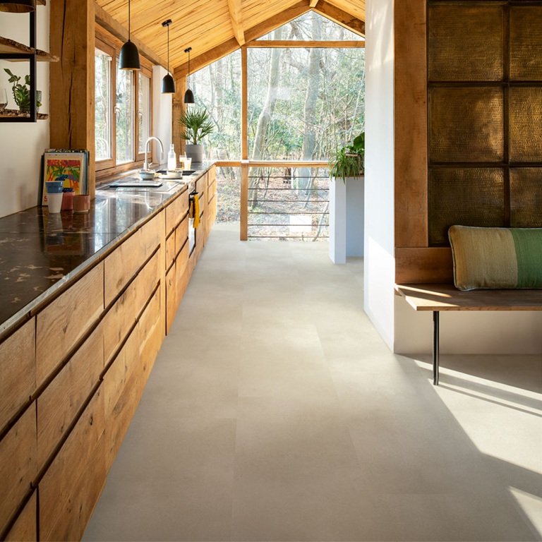 Alliance Bois - Tassin - Lyon - QUICK-STEP - Dalle luxueuse de taille moyenne Compatible avec un plancher chauffant/rafraîchissant Aspect de pierre naturelle Garantie domestique à vie Sous-couche intégrée Résistant à l’eau 